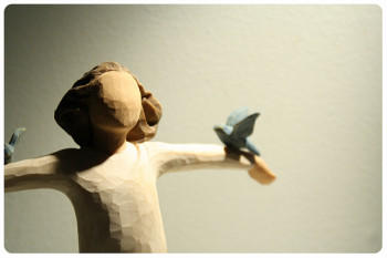 figurine with bluebirds