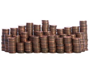 stacks of old dirty pennies. bronze and copper pennies isolated