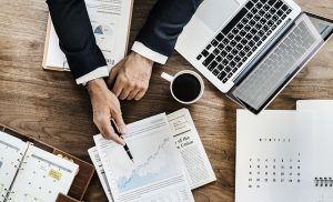 Business person hand, keyboard